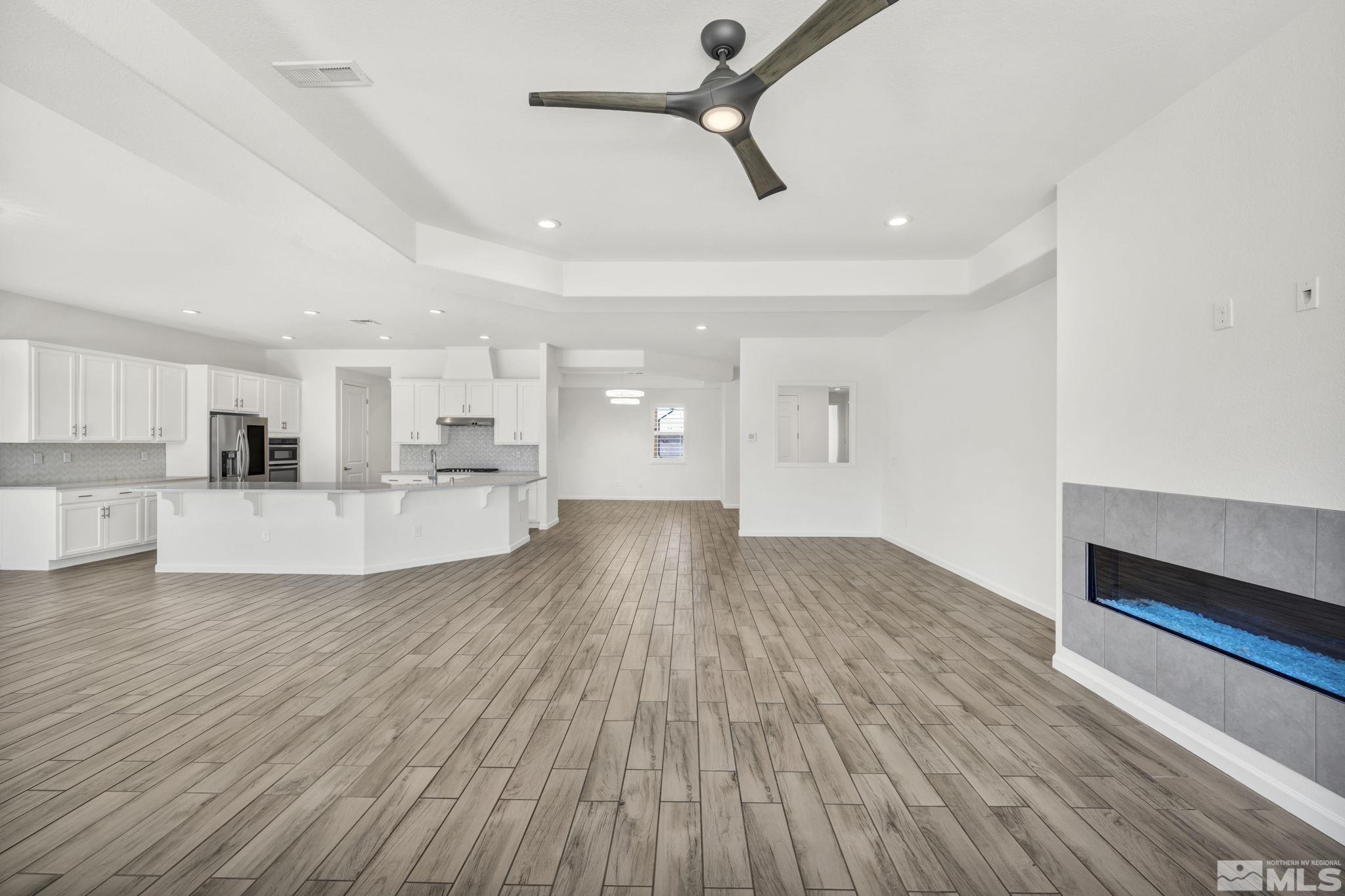 2013 Neviekay Lane Reno, NV 89521 - Photo 17 of 35 a view of empty room with wooden floor