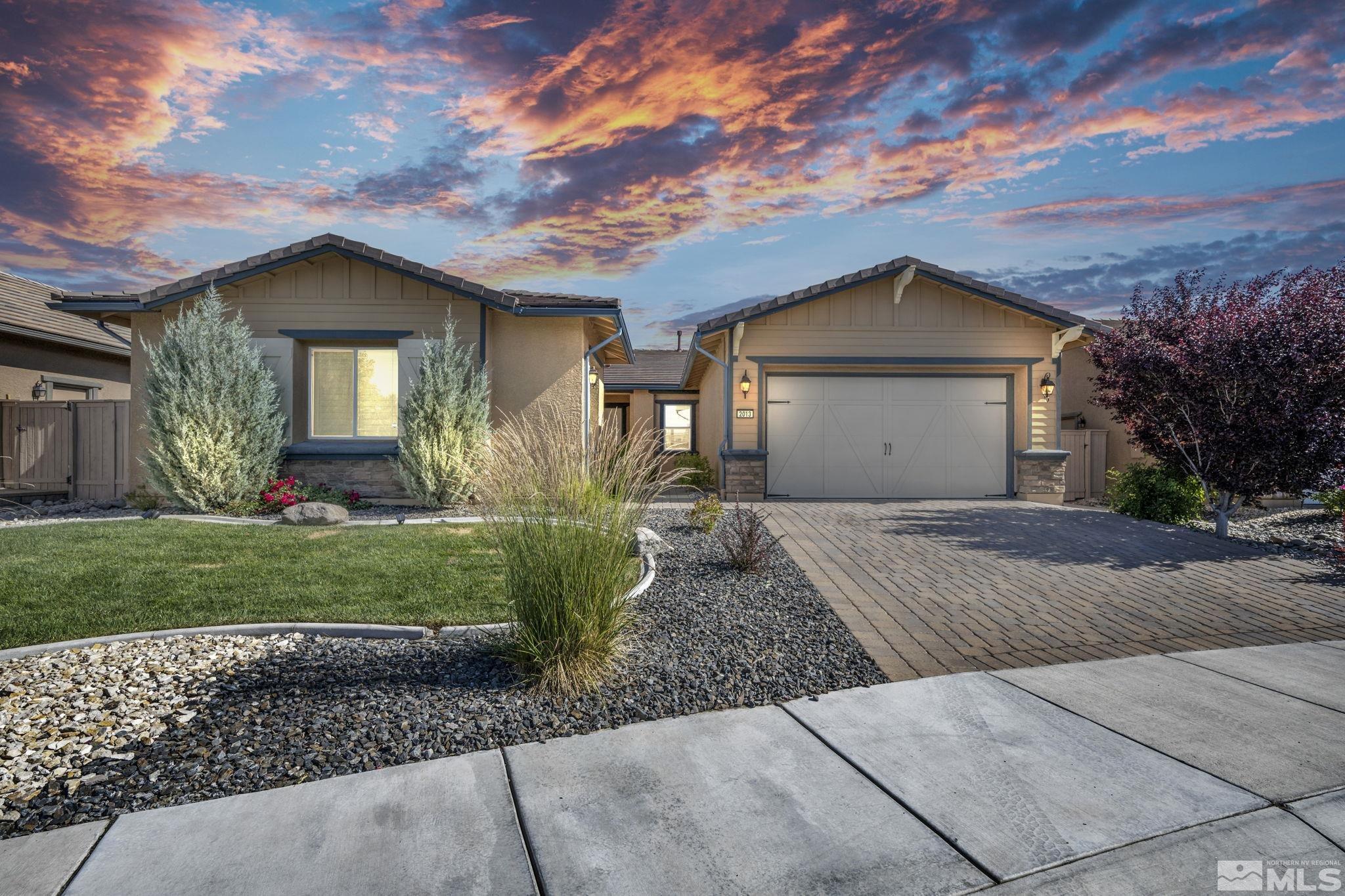 2013 Neviekay Lane Reno, NV 89521 - Photo 2 of 35 a front view of a house with garden