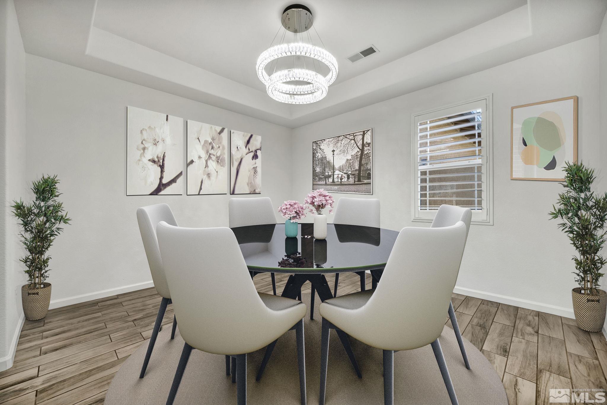 2013 Neviekay Lane Reno, NV 89521 - Photo 7 of 35 a view of a dining room with furniture and wooden floor