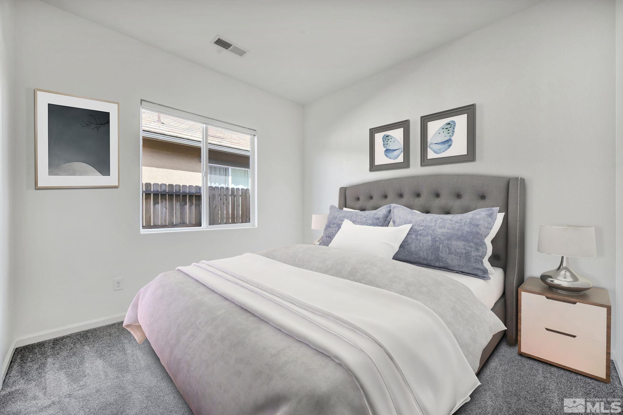 2013 Neviekay Lane Reno, NV 89521 - Photo 10 of 35 a bedroom with a bed and a window
