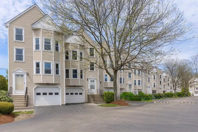 a front view of a building with a street