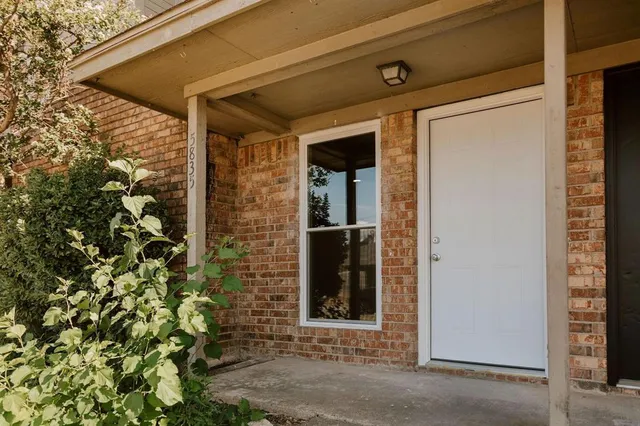 a front view of a house with a shower