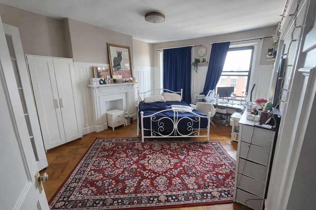 30 Claflin Road, Unit 2 Brookline, MA 02445 - Photo 5 of 10 a room with microwave stove and refrigerator