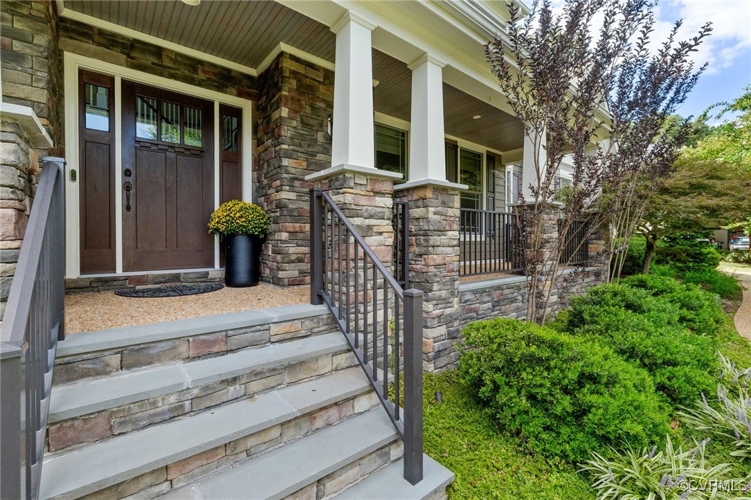 569 Raleigh Manor Road Henrico, VA 23229 - Photo 5 of 46 A Craftsman elevation with stone and Cement Board