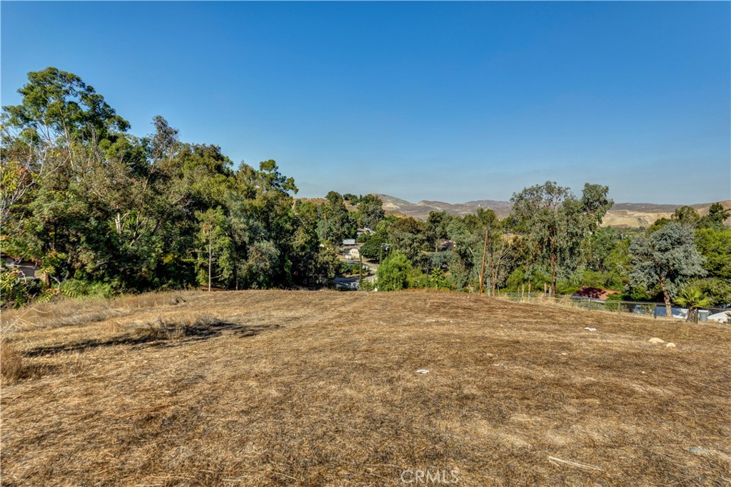 0 Weirick Road Corona, CA 92883 - Photo 7 of 18 a view of dirt road with a building in the background