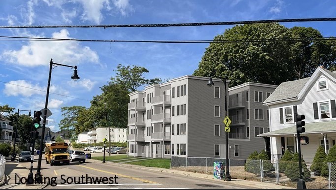 1081 River Street Boston, MA 02136 - Photo 7 of 8 a front view of a building with street view