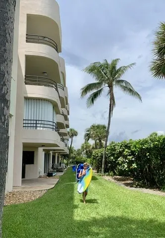 a view of a building with a park