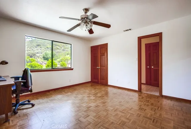 a bathroom with a sink a mirror and a shower