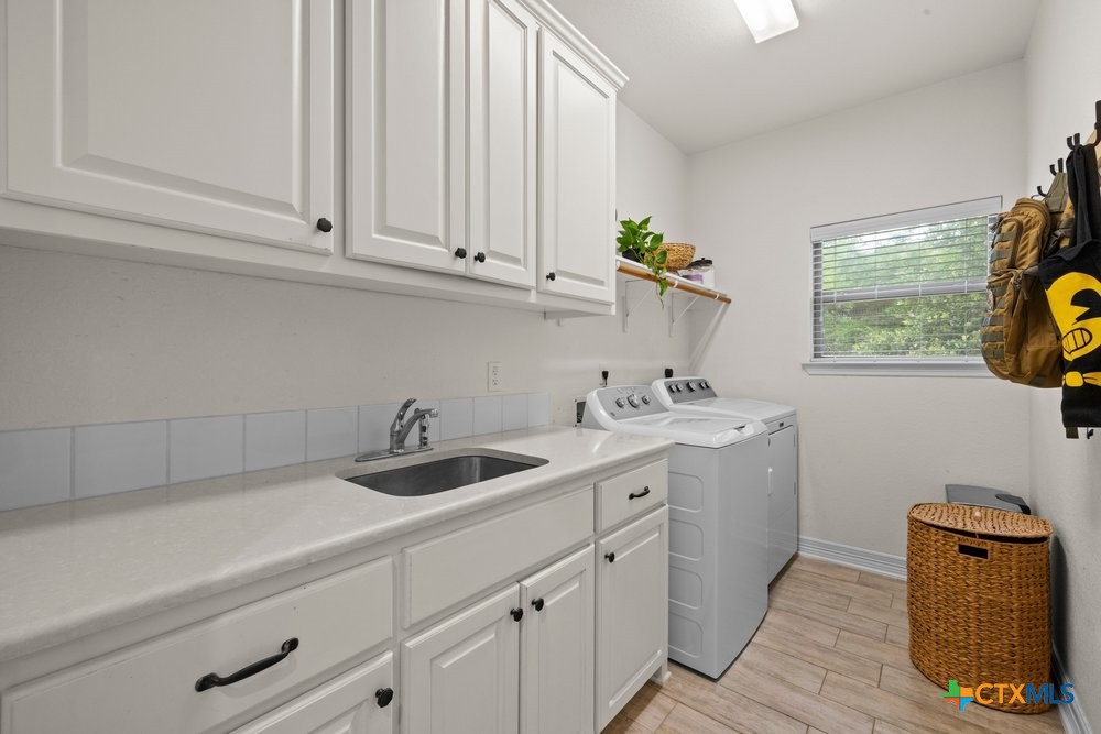 2402 Twin Ridge Court Belton, TX 76513 - Photo 28 of 42 Laundry room