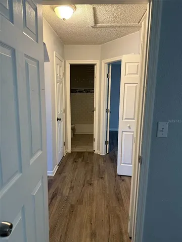 a view of wooden floor in an empty room