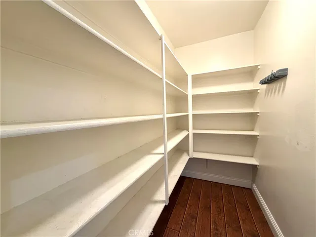 a view of staircase with wooden floor and staircase