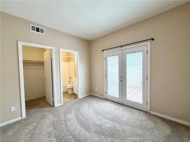 a view of a bathroom with a bathtub