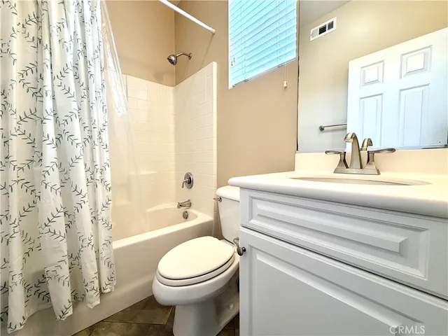 a bathroom with a double vanity sink mirror and double