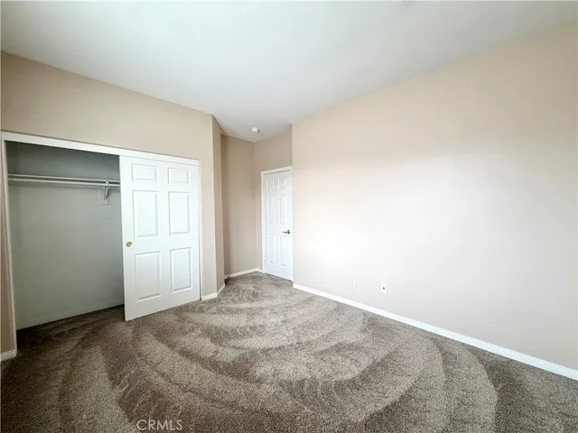 a large bathroom with a large tub and sink