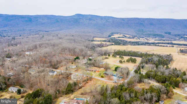 an aerial view of residential house with outdoor space