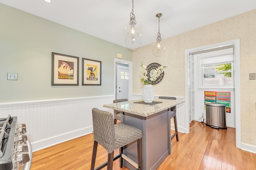 112 Perham Street Boston, MA 02132 - Photo 16 of 36 a view of a dining room with furniture window and wooden floor