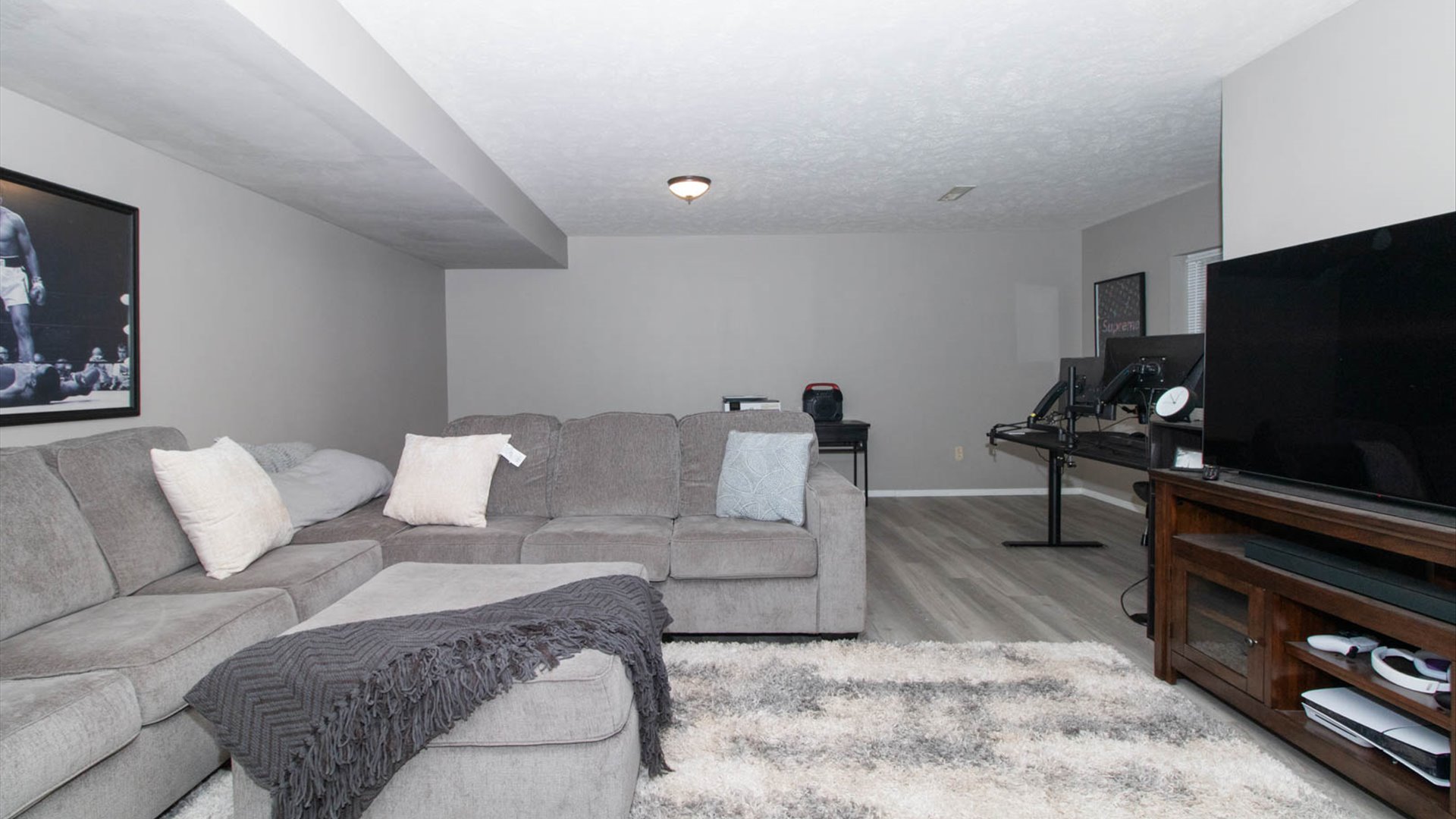 4 Shire Court Bloomington, IL 61701 - Photo 2 of 33 a living room with furniture and a flat screen tv