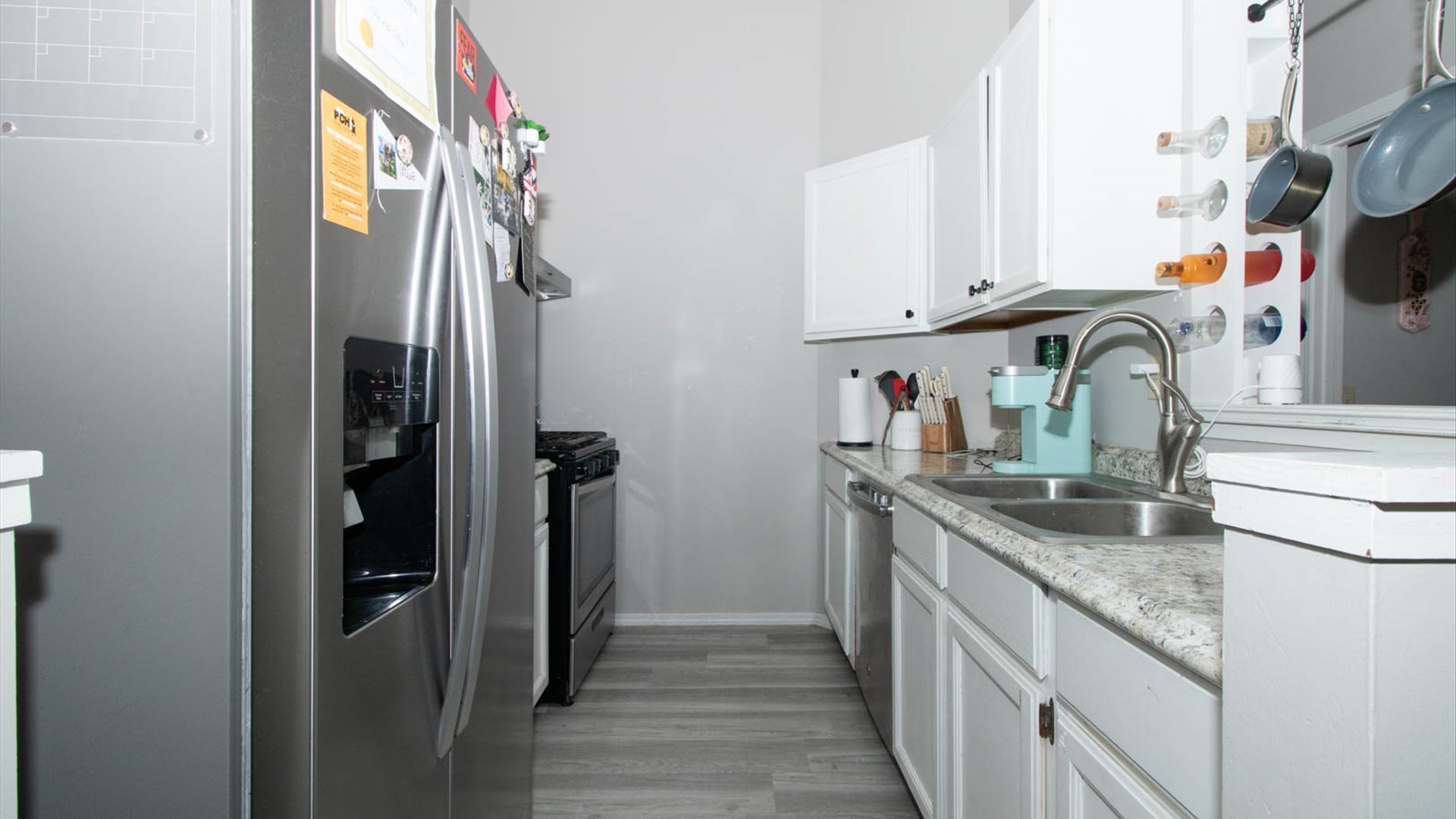 4 Shire Court Bloomington, IL 61701 - Photo 21 of 33 a kitchen with stainless steel appliances granite countertop a refrigerator and a sink