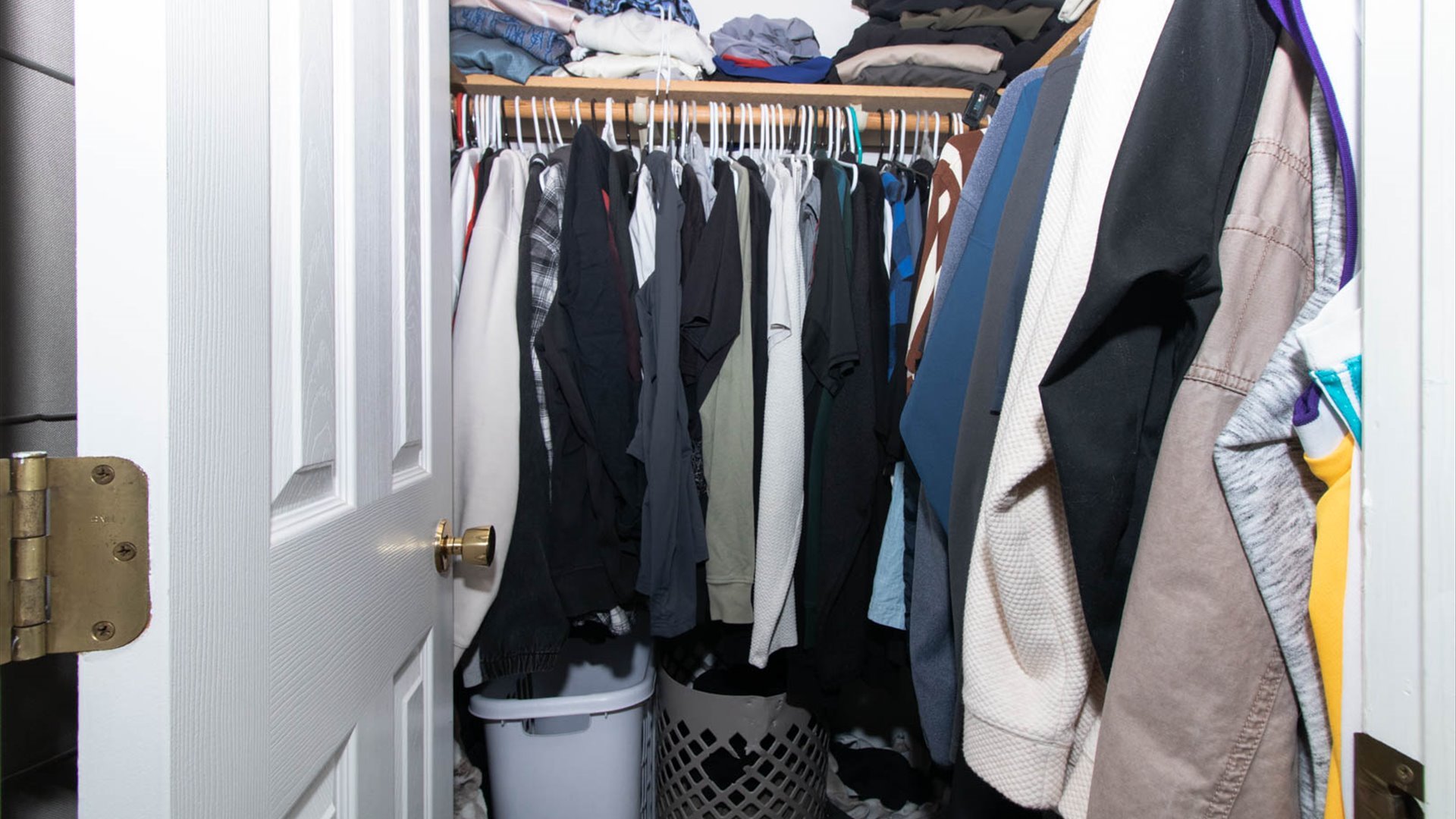 4 Shire Court Bloomington, IL 61701 - Photo 27 of 33 a view of walk in closet with clothes and shoes