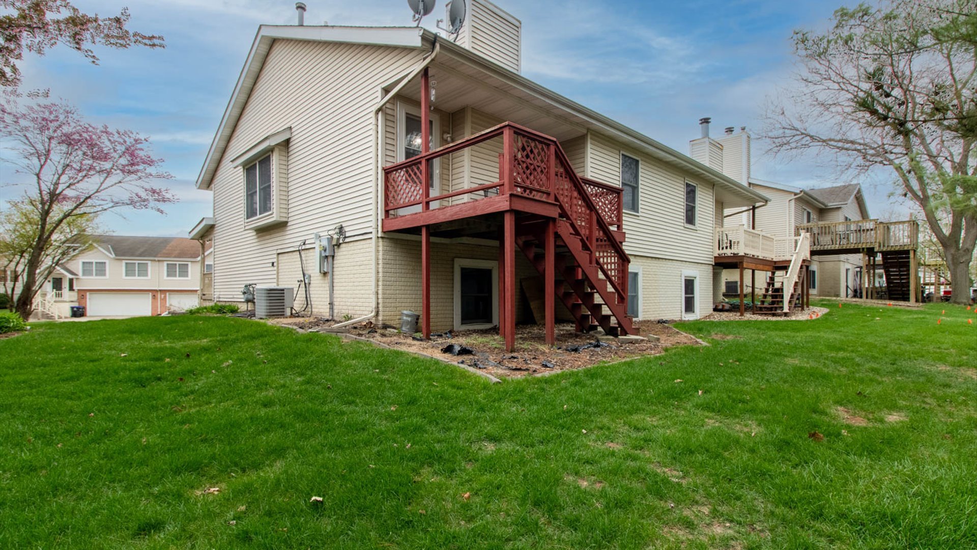 4 Shire Court Bloomington, IL 61701 - Photo 29 of 33 a view of a house with a yard and sitting area