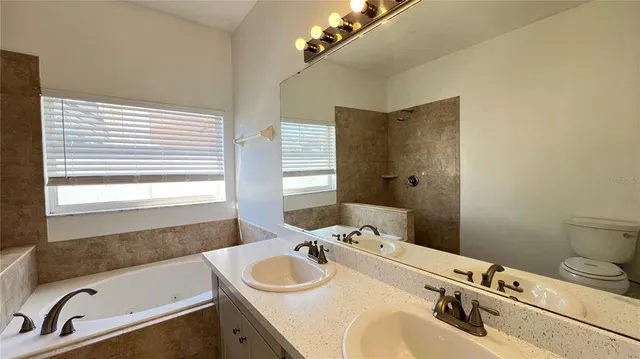 a bathroom with a sink and a bathtub