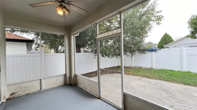 a view of a porch with a backyard