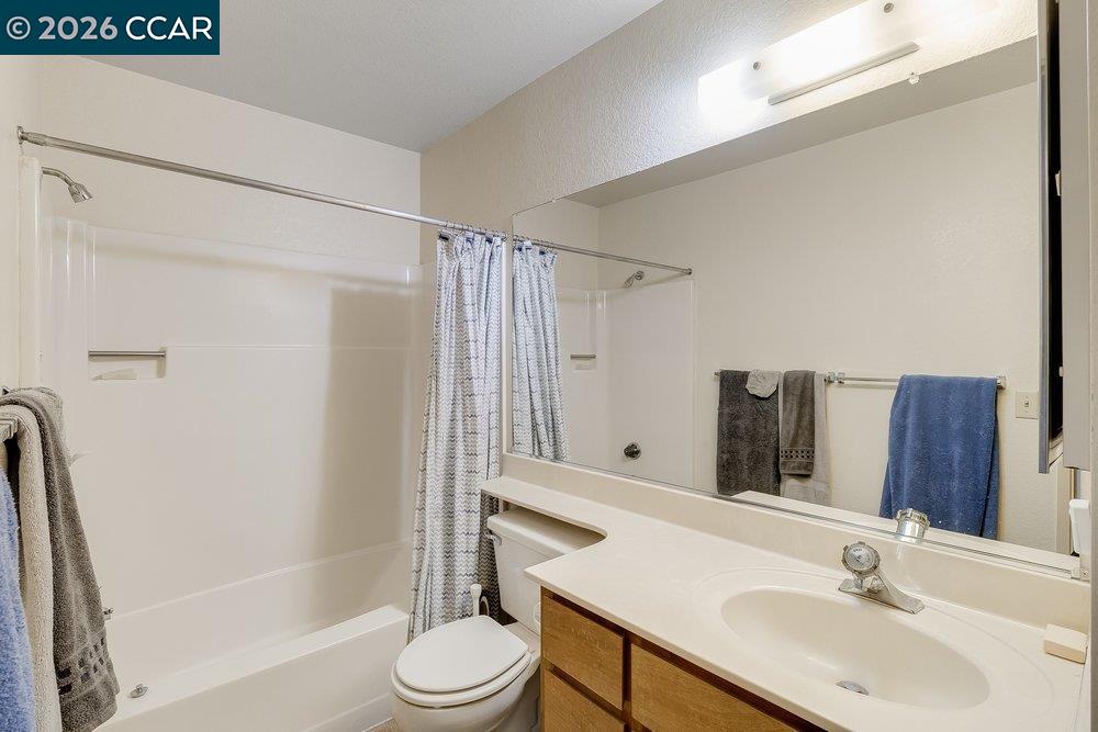 1123 Chadwick Circle Bay Point, CA 94565 - Photo 17 of 26 a bathroom with a sink toilet and shower