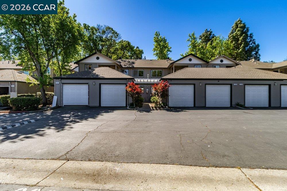1123 Chadwick Circle Bay Point, CA 94565 - Photo 2 of 26 a front view of a house with a garden