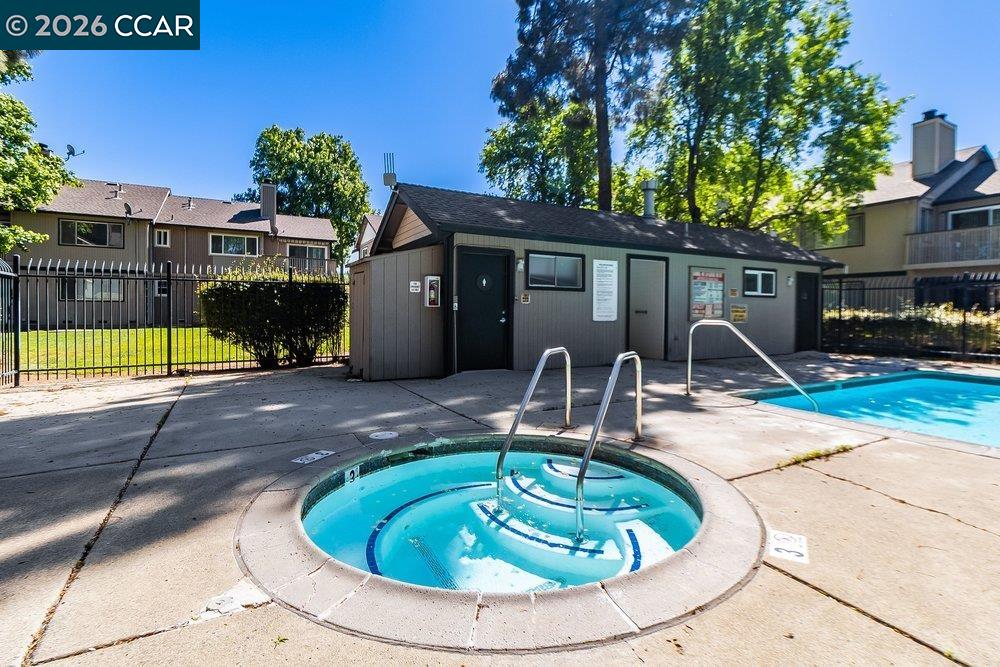 1123 Chadwick Circle Bay Point, CA 94565 - Photo 26 of 26 a house view with a swimming pool