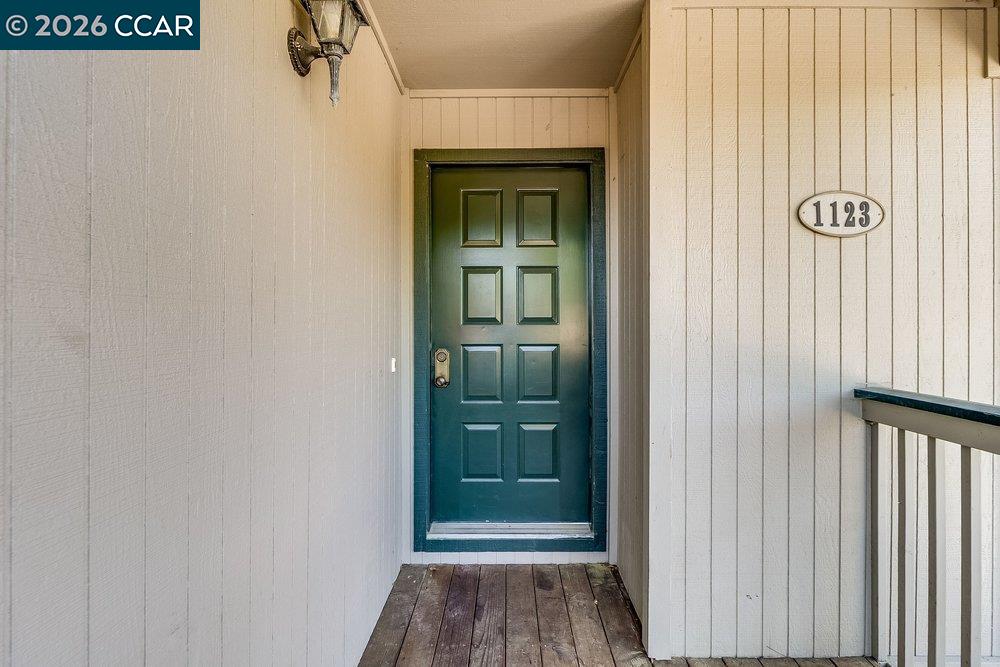 1123 Chadwick Circle Bay Point, CA 94565 - Photo 5 of 26 a view of a hallway with wooden floor