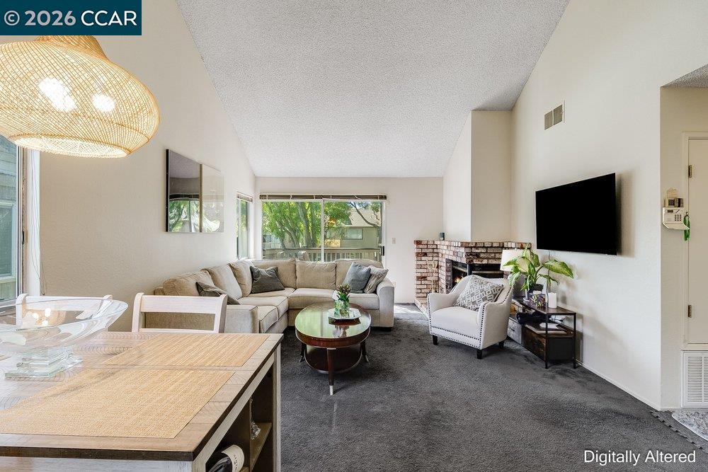 1123 Chadwick Circle Bay Point, CA 94565 - Photo 7 of 26 a living room with furniture and a flat screen tv