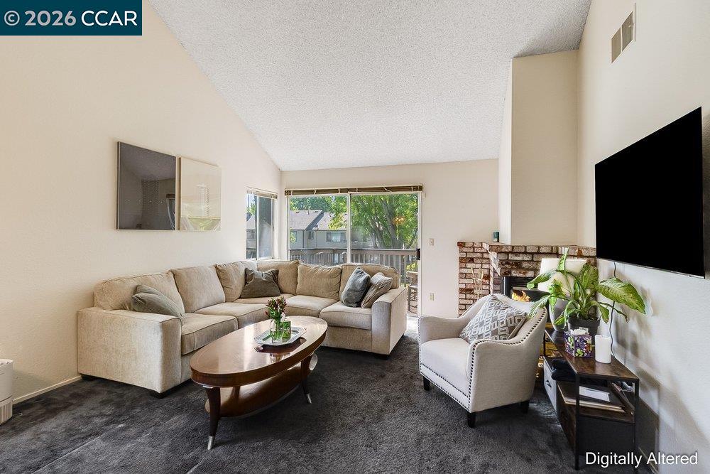 1123 Chadwick Circle Bay Point, CA 94565 - Photo 8 of 26 a living room with furniture and a flat screen tv
