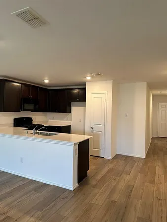 a view of a room with car parked