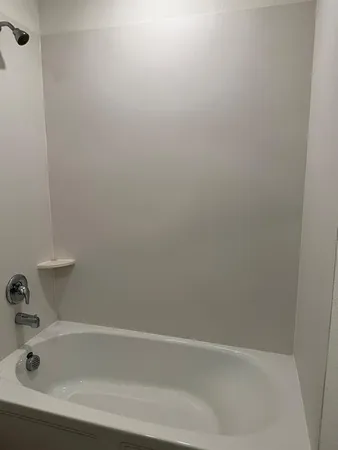 a bathroom with a bathtub
