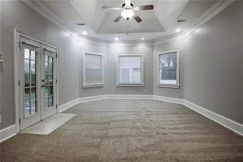 a view of an empty room with a window