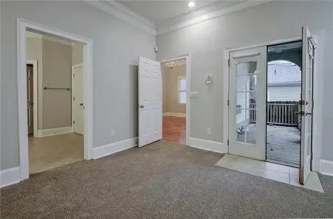 wooden floor and closet area in a room