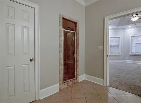 wooden view of a hallway with a elevator