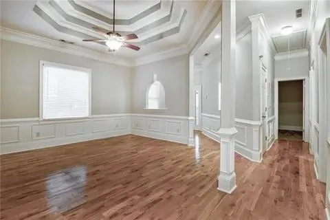 a view of a livingroom with wooden floor
