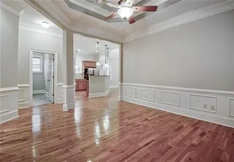 a view of a livingroom with wooden floor