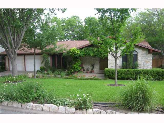 12401 Knoll Ridge Drive Austin, TX 78758 - Photo 1 of 1 a view of a house with a backyard
