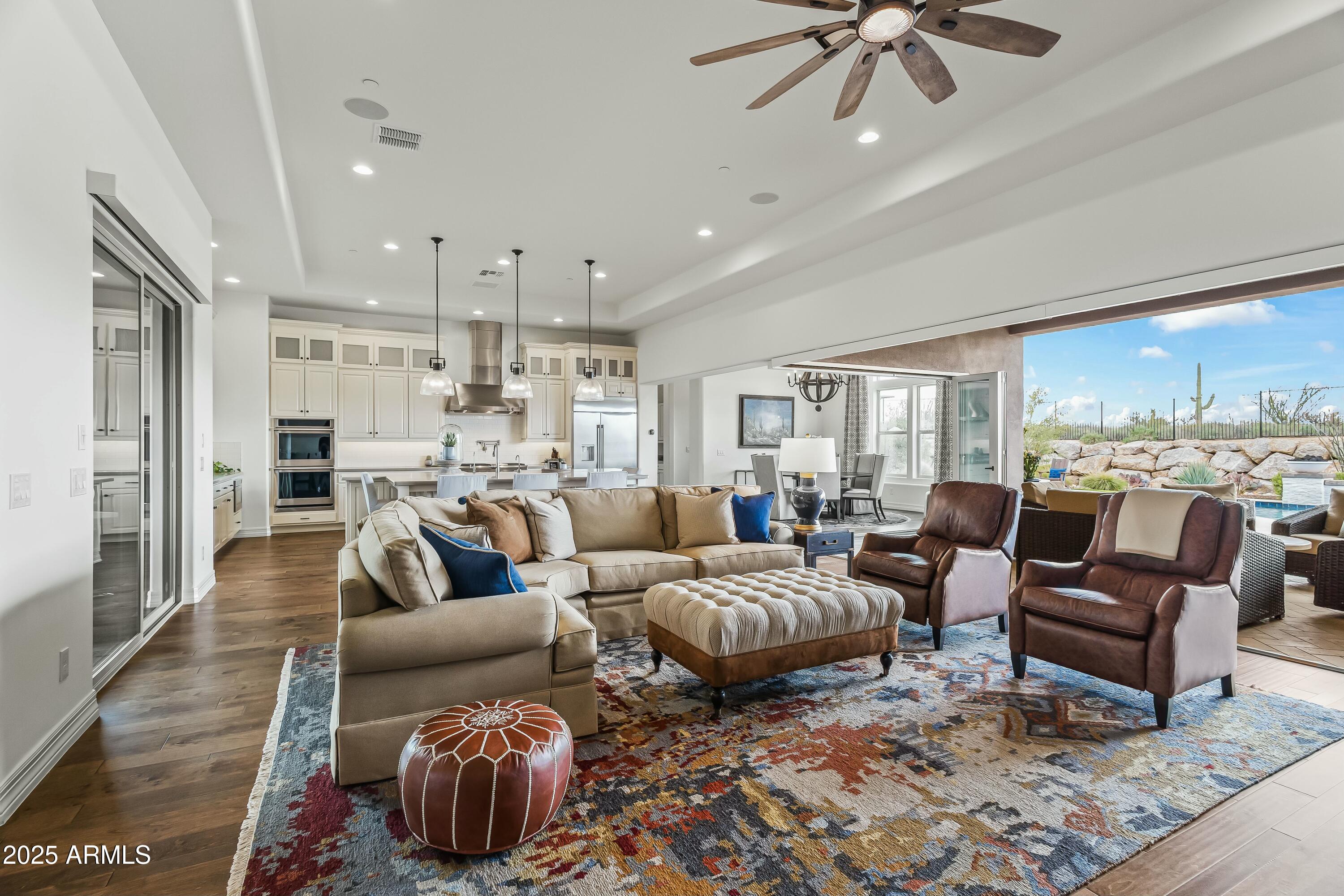 8769 East Granite Pass Road Scottsdale, AZ 85266 - Photo 2 of 23 a living room with furniture and a large window