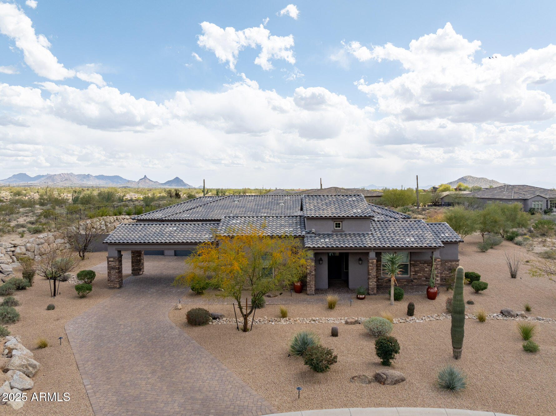 8769 East Granite Pass Road Scottsdale, AZ 85266 - Photo 21 of 23 a view of a terrace with lawn chairs