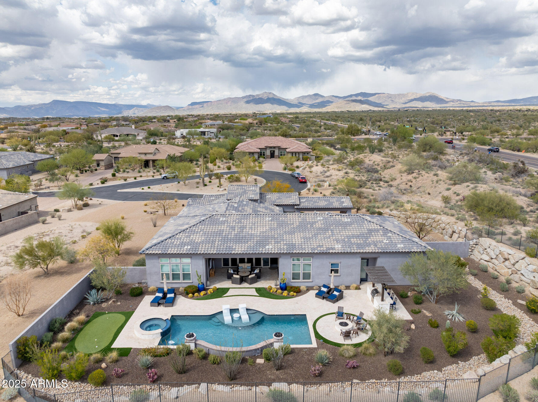 8769 East Granite Pass Road Scottsdale, AZ 85266 - Photo 3 of 23 a view of a city with furniture