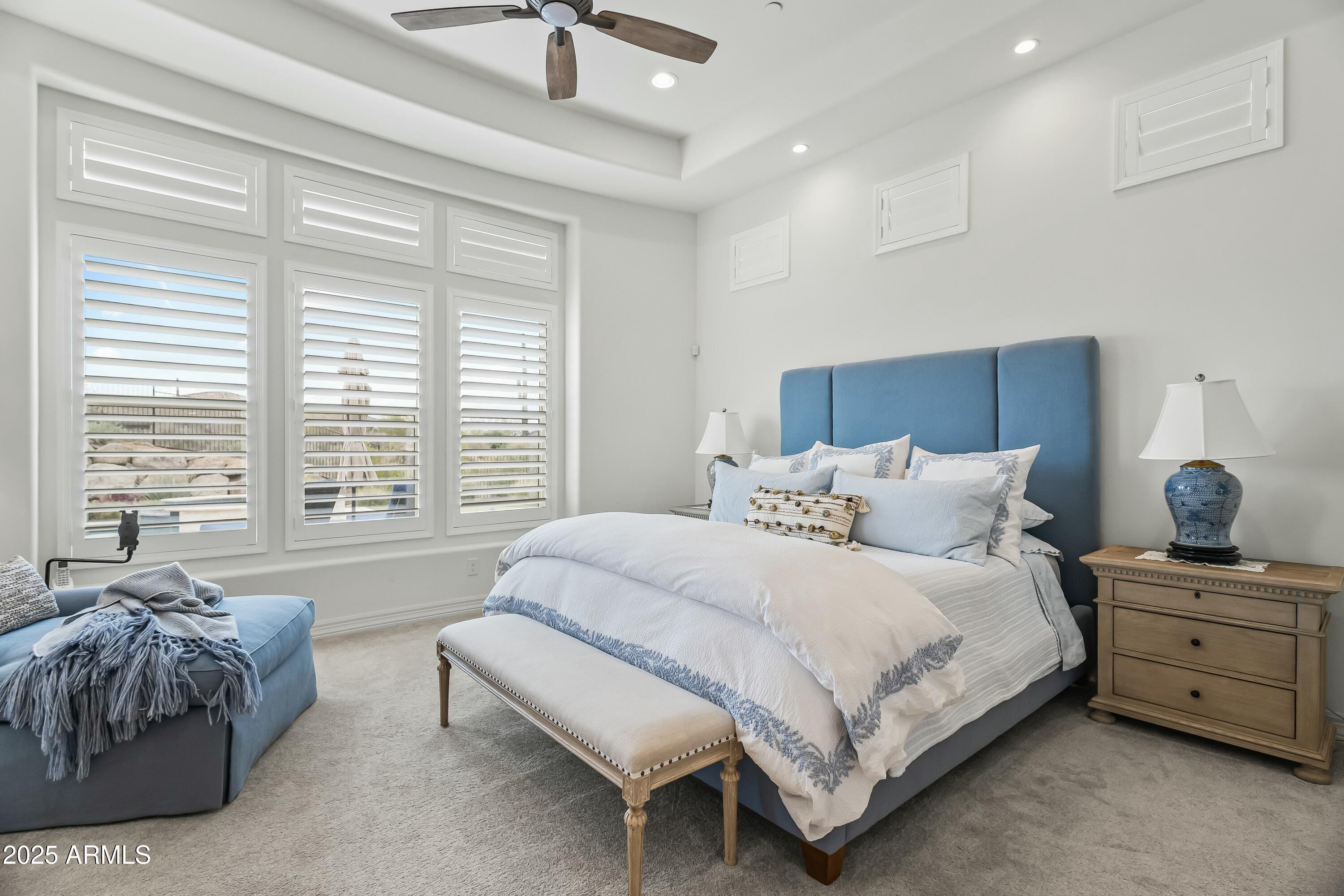 8769 East Granite Pass Road Scottsdale, AZ 85266 - Photo 8 of 23 a bedroom with a bed and a couch