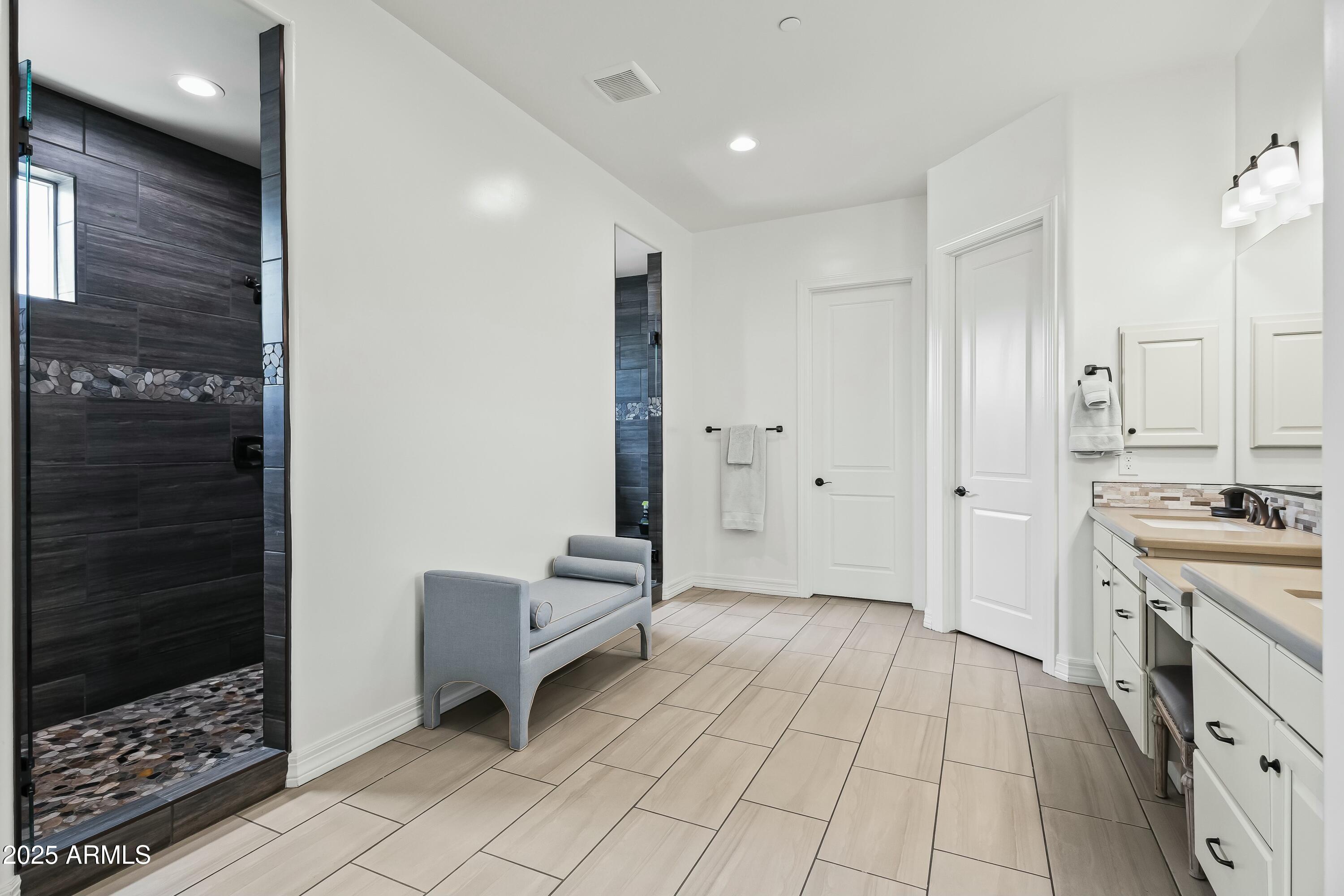 8769 East Granite Pass Road Scottsdale, AZ 85266 - Photo 9 of 23 a view of a hallway with entryway to a bedroom