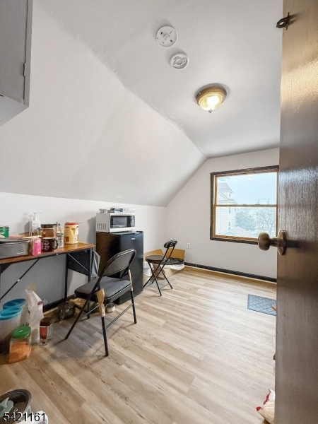 66 Washington Place East Rutherford, NJ 07073 - Photo 18 of 35 a view of a workspace with furniture and a window