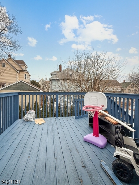 66 Washington Place East Rutherford, NJ 07073 - Photo 22 of 35 a view of balcony with wooden floor