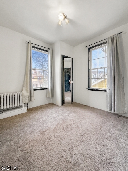 66 Washington Place East Rutherford, NJ 07073 - Photo 25 of 35 an empty room with windows and closet