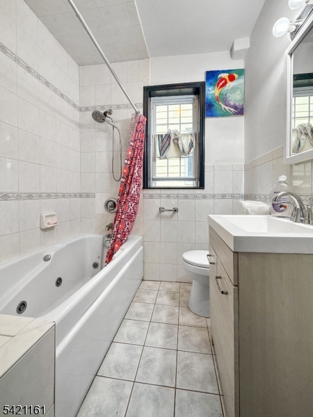 66 Washington Place East Rutherford, NJ 07073 - Photo 27 of 35 a bathroom with a sink a toilet and a bathtub