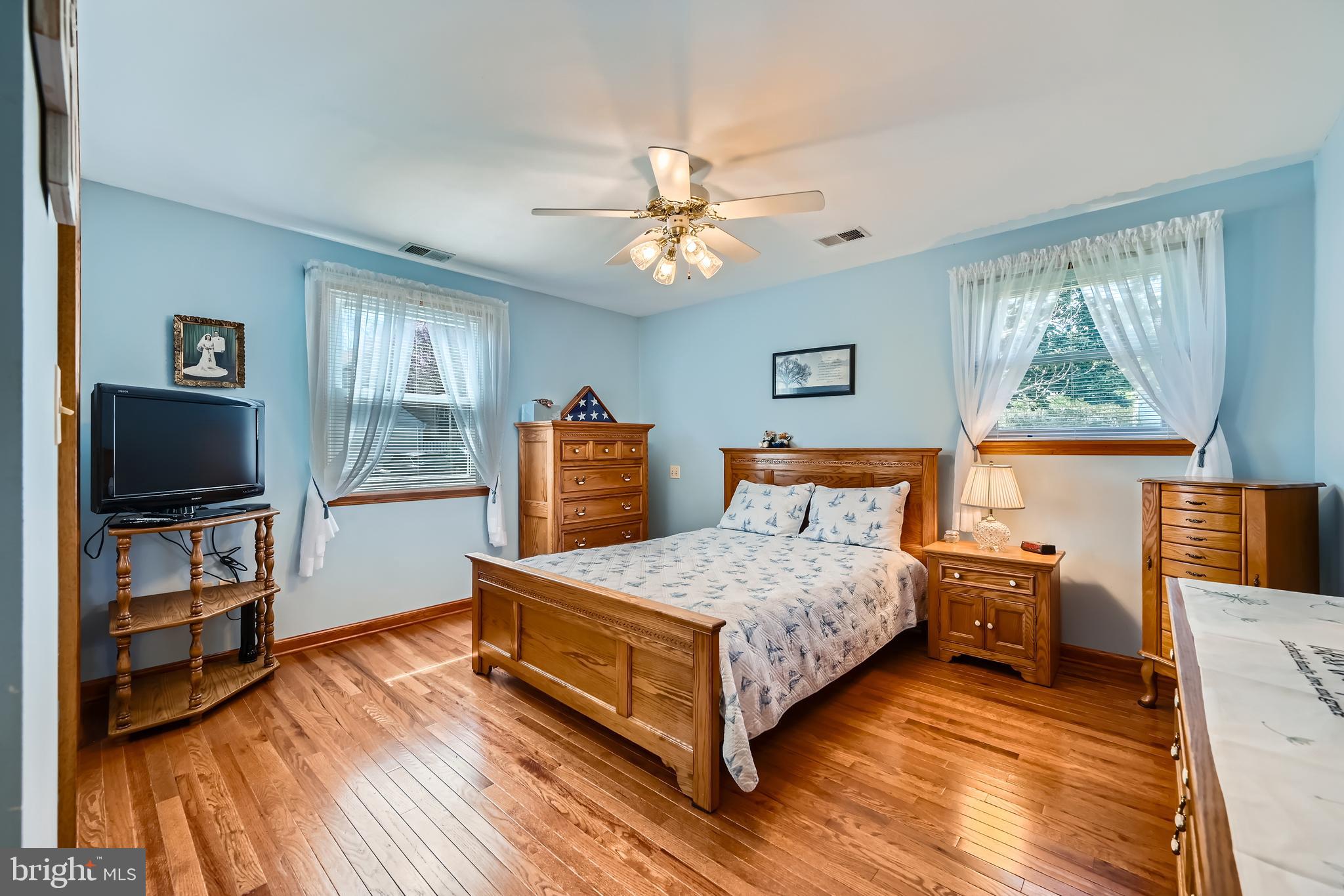 1722 Anne Avenue Baltimore, MD 21221 - Photo 13 of 28 a bedroom with a bed and a flat screen tv